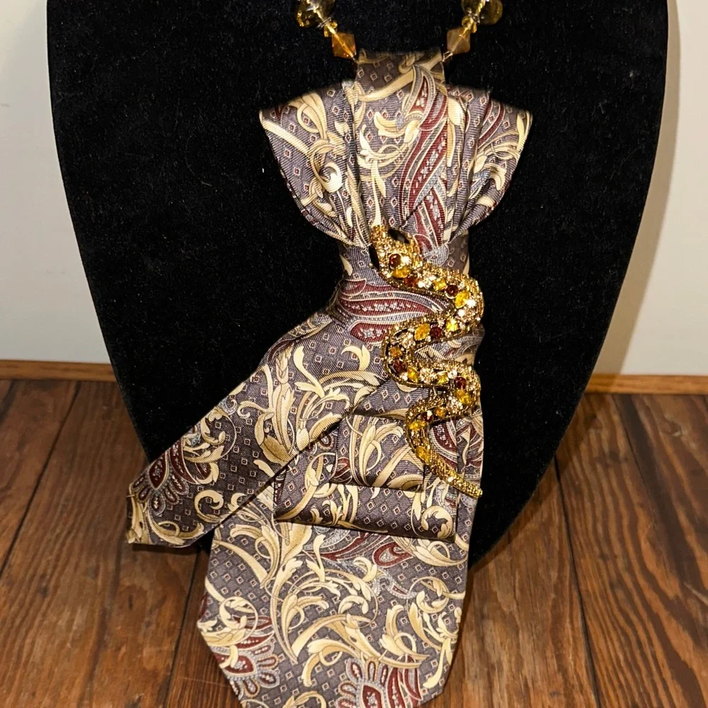Elegant Paisley Silk Tie with Gold rhinestone snake on beaded necklace.